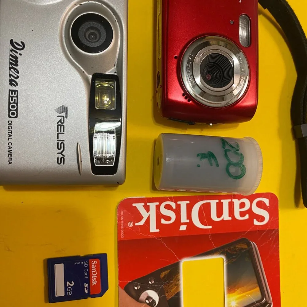CAMERAS, VIVITAR AND DIMERA DIGITAL 3500 GENTLY USED